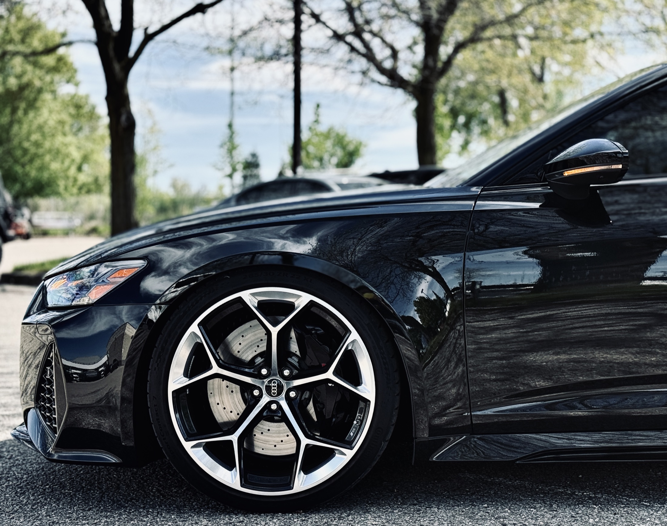 Black vehicle detail protected by clear PPF
