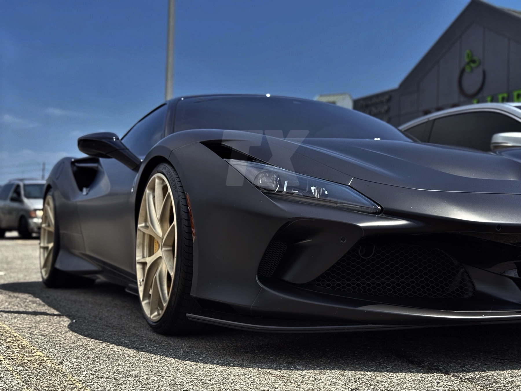 Matte black sports car protected with matte PPF